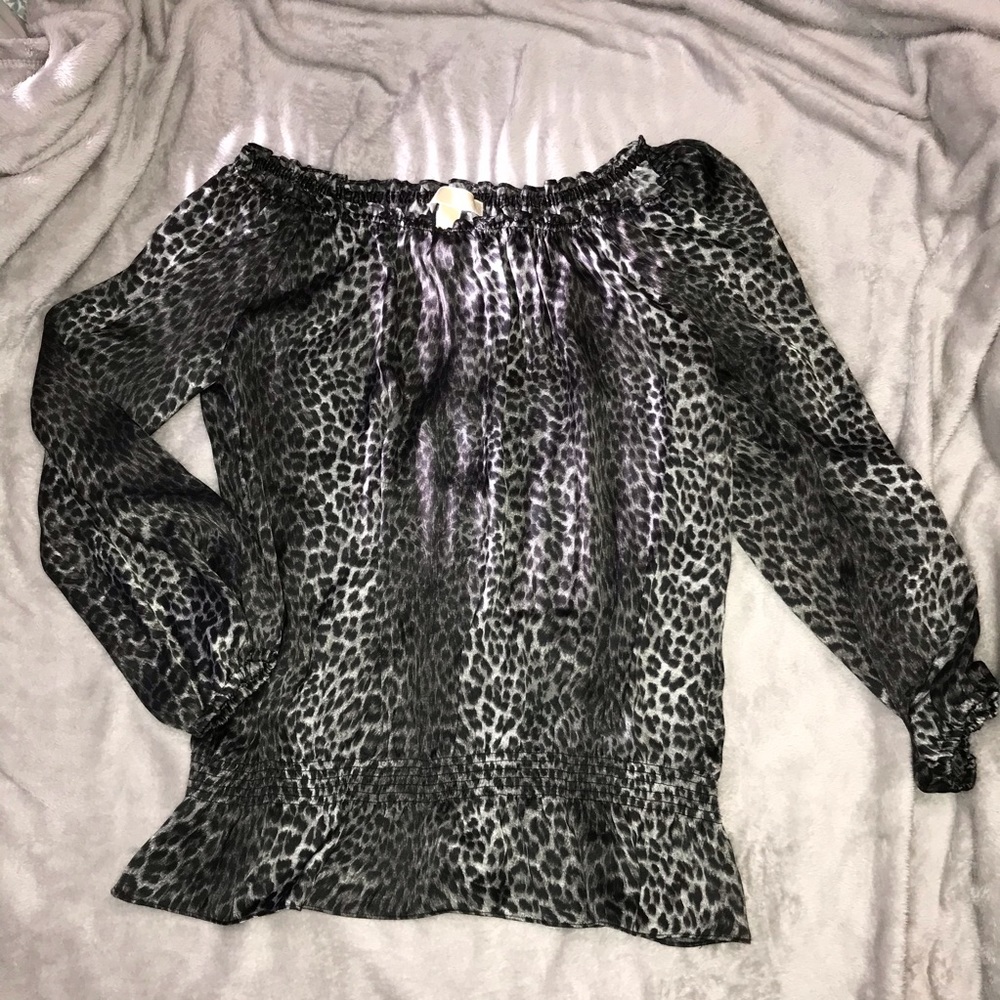 Animal print blouse.